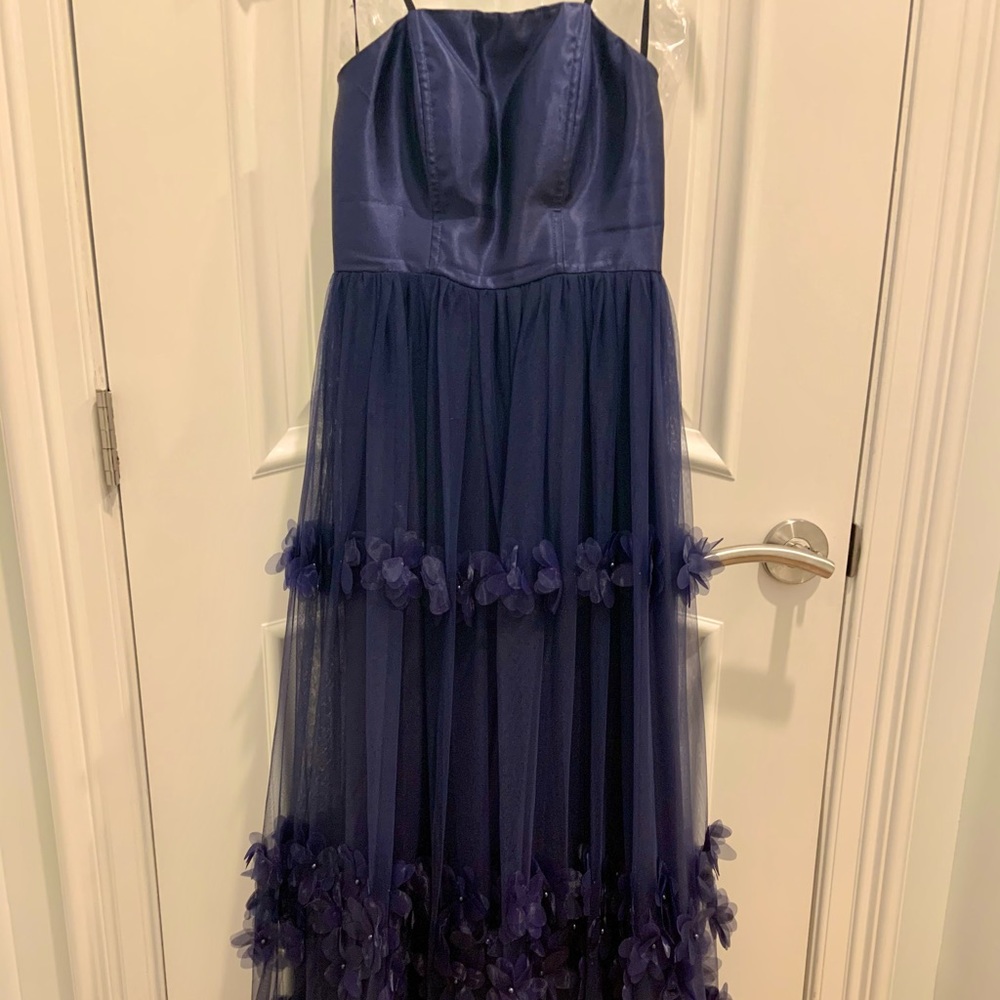 Strapless navy tulle back dress with floral details. Size 0. Hemmed.